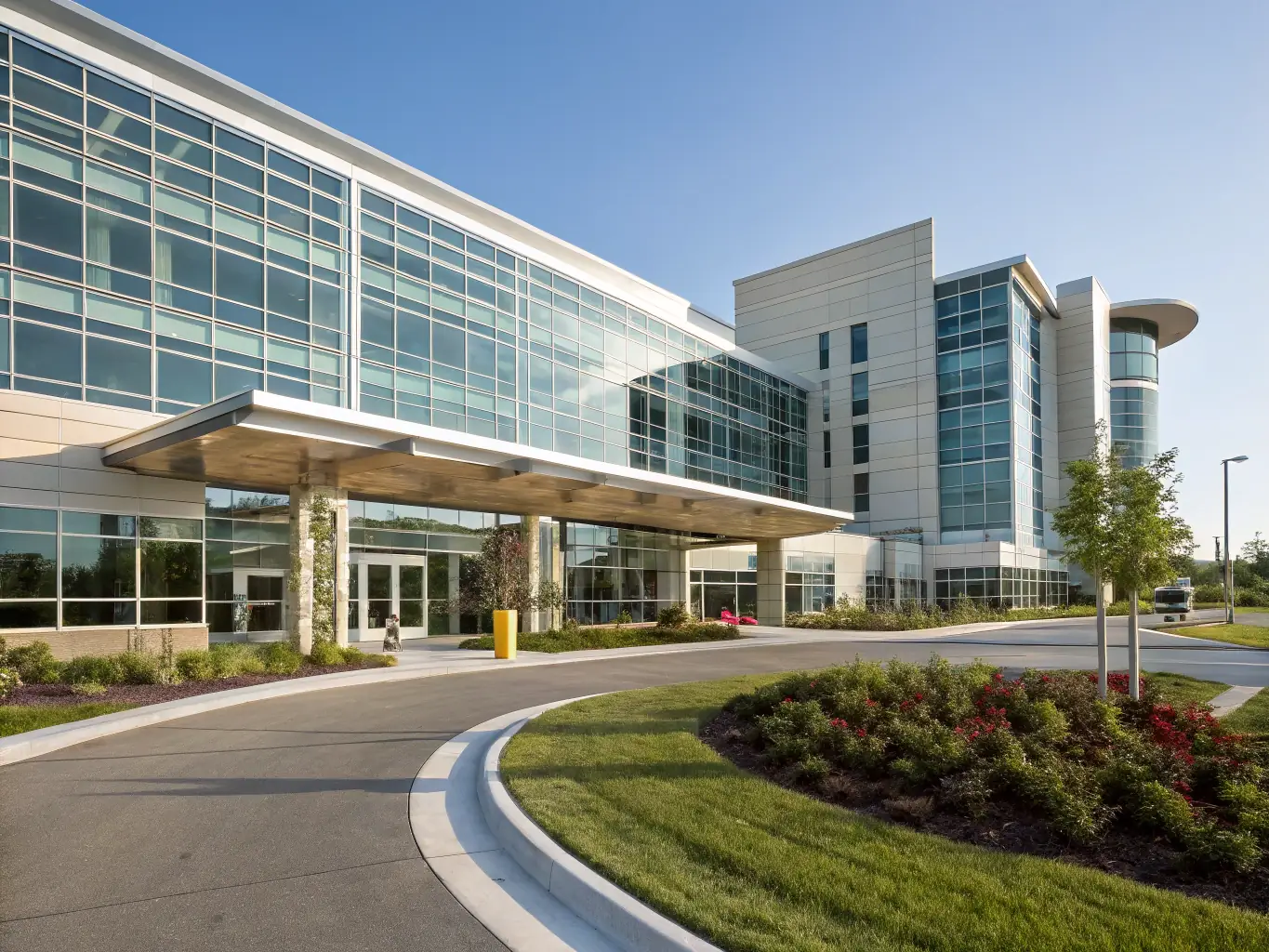 A hospital building with advanced HVAC and lighting systems, emphasizing improved environmental quality and patient comfort.