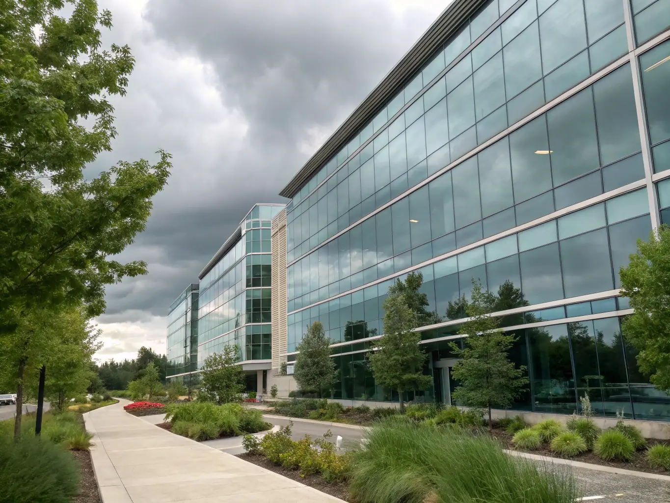 A modern office building with solar panels and smart glass, showcasing energy efficiency and technological integration, emphasizing GreenSmart Ltd.'s commitment to sustainability.